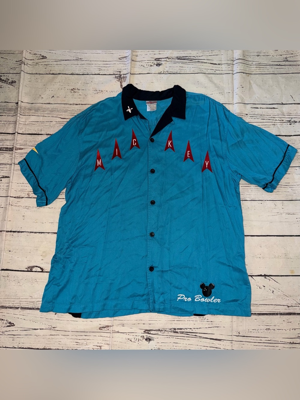 Disney Teal Short-Sleeve Button-Down Bowling Shirt with Black Collar